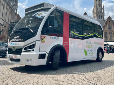 Shuttle bus operating daily between Bruges city center and the railway station.